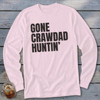 Pink long-sleeve shirt with black text that reads "GONE CRAWDAD HUNTIN'".