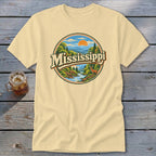 Yellow t-shirt with a circular graphic depicting a landscape with the word "Mississippi".