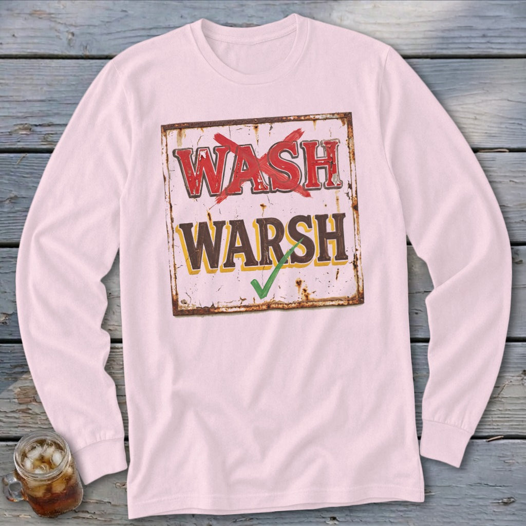 Light pink long-sleeve t-shirt featuring a vintage sign graphic with red text crossed out and brown text checked.