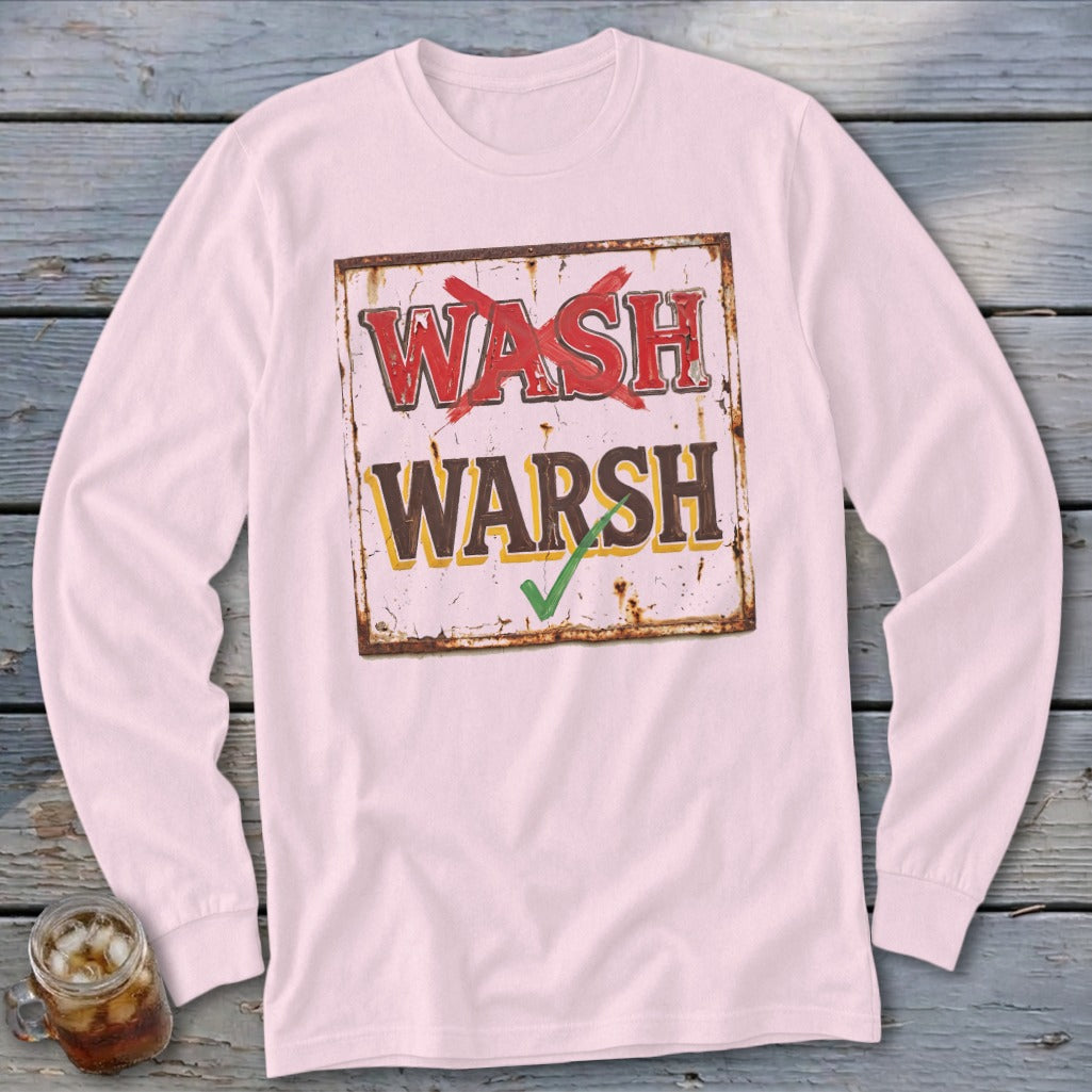 Light pink long-sleeve t-shirt featuring a vintage sign graphic with red text crossed out and brown text checked.