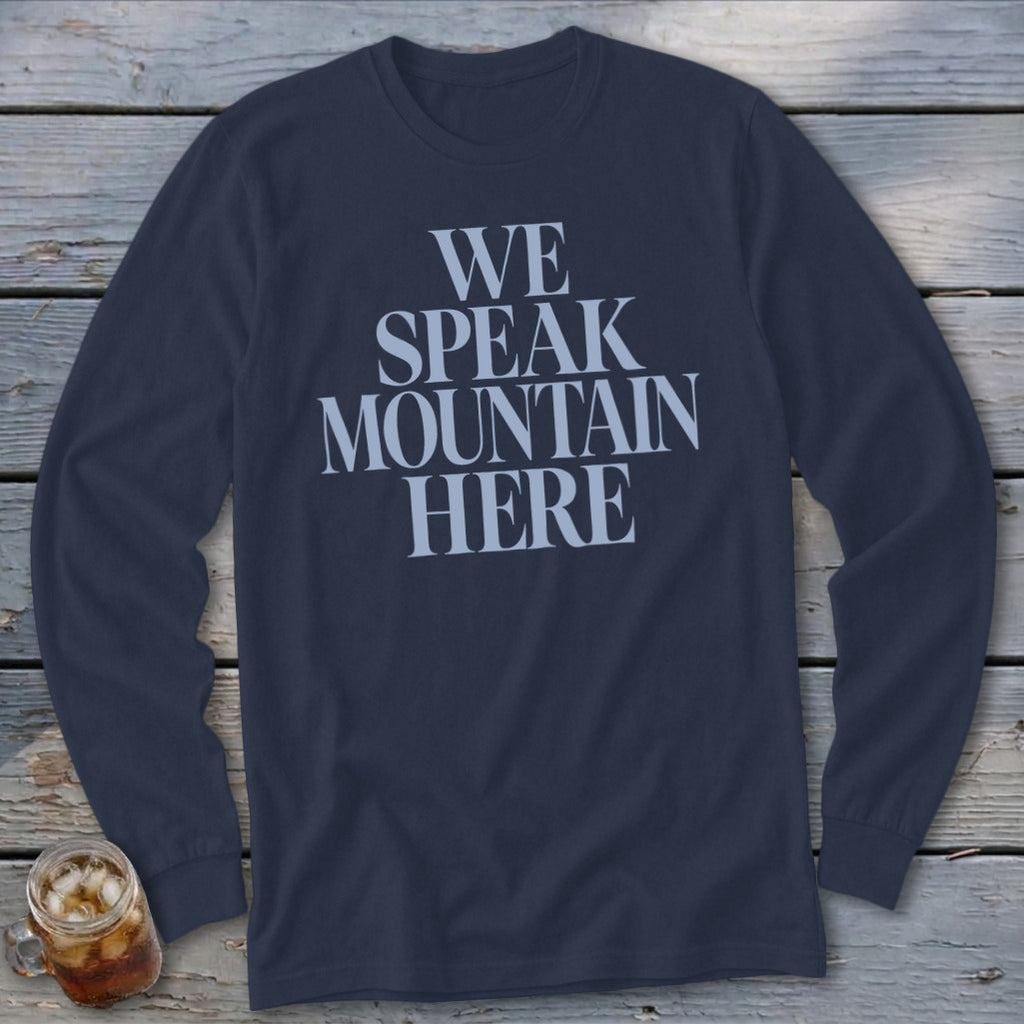 Navy long sleeve shirt with "WE SPEAK MOUNTAIN HERE" text in light blue.