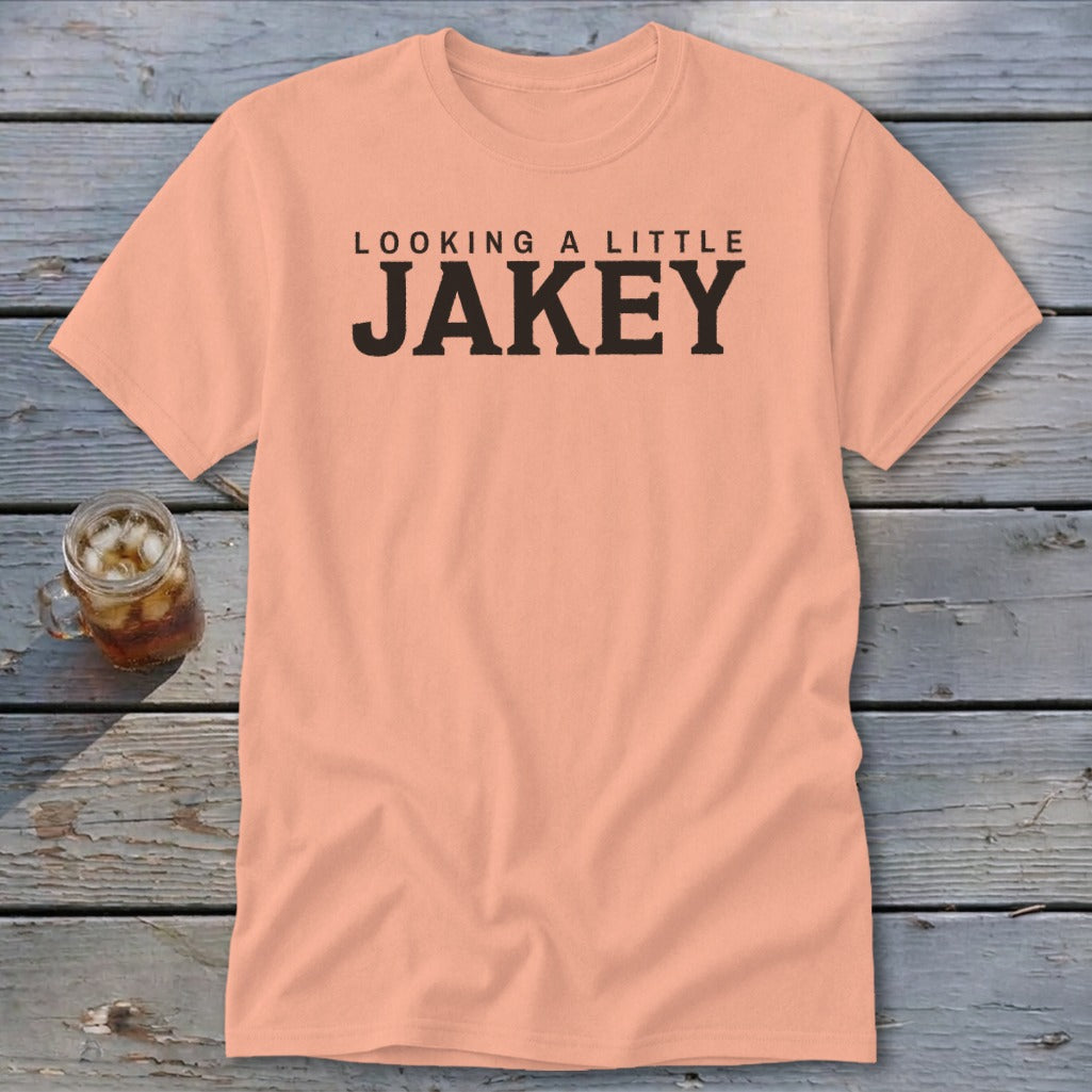 Peach t-shirt with "LOOKING A LITTLE JAKEY" text in black.