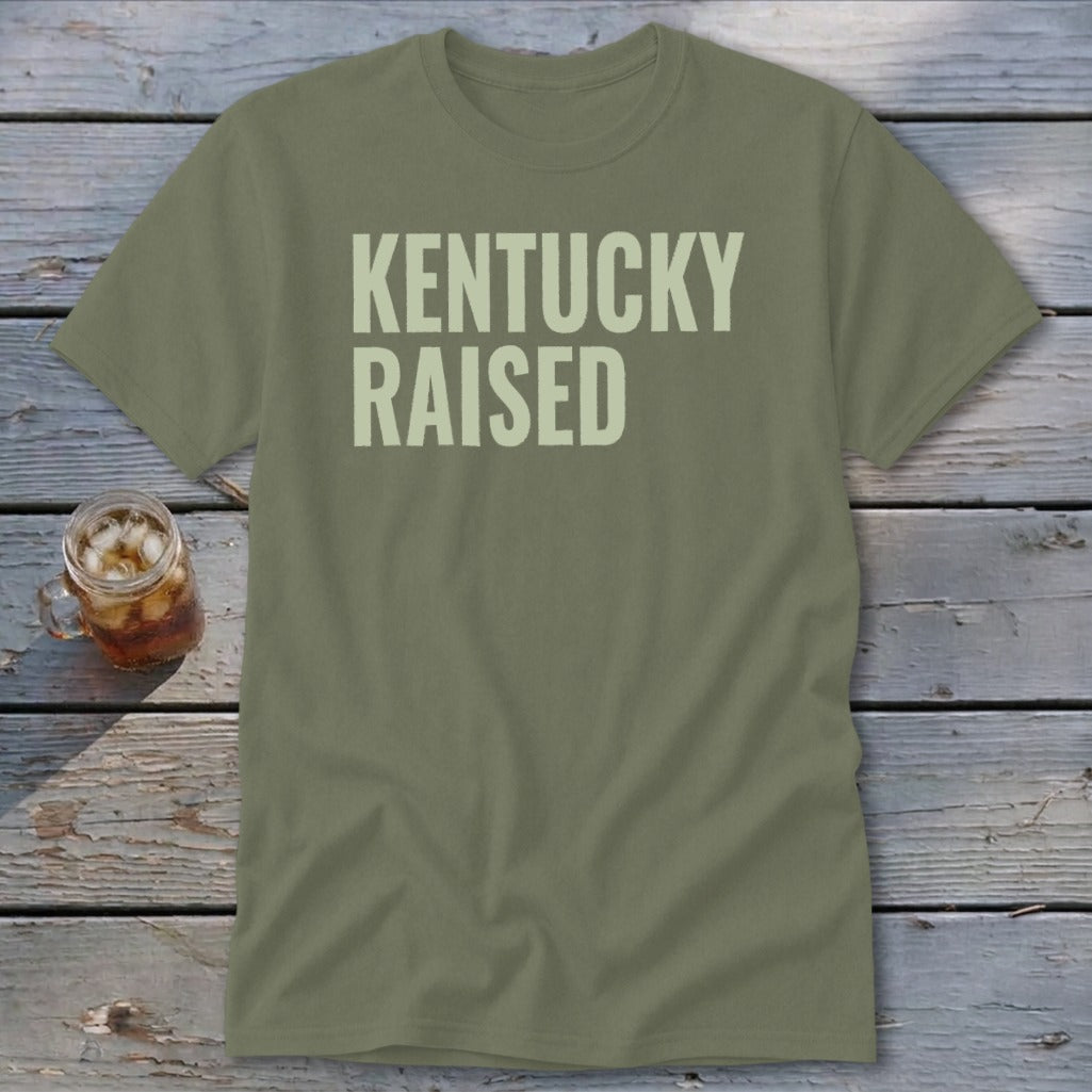 Olive green t-shirt with "Kentucky Raised" text.