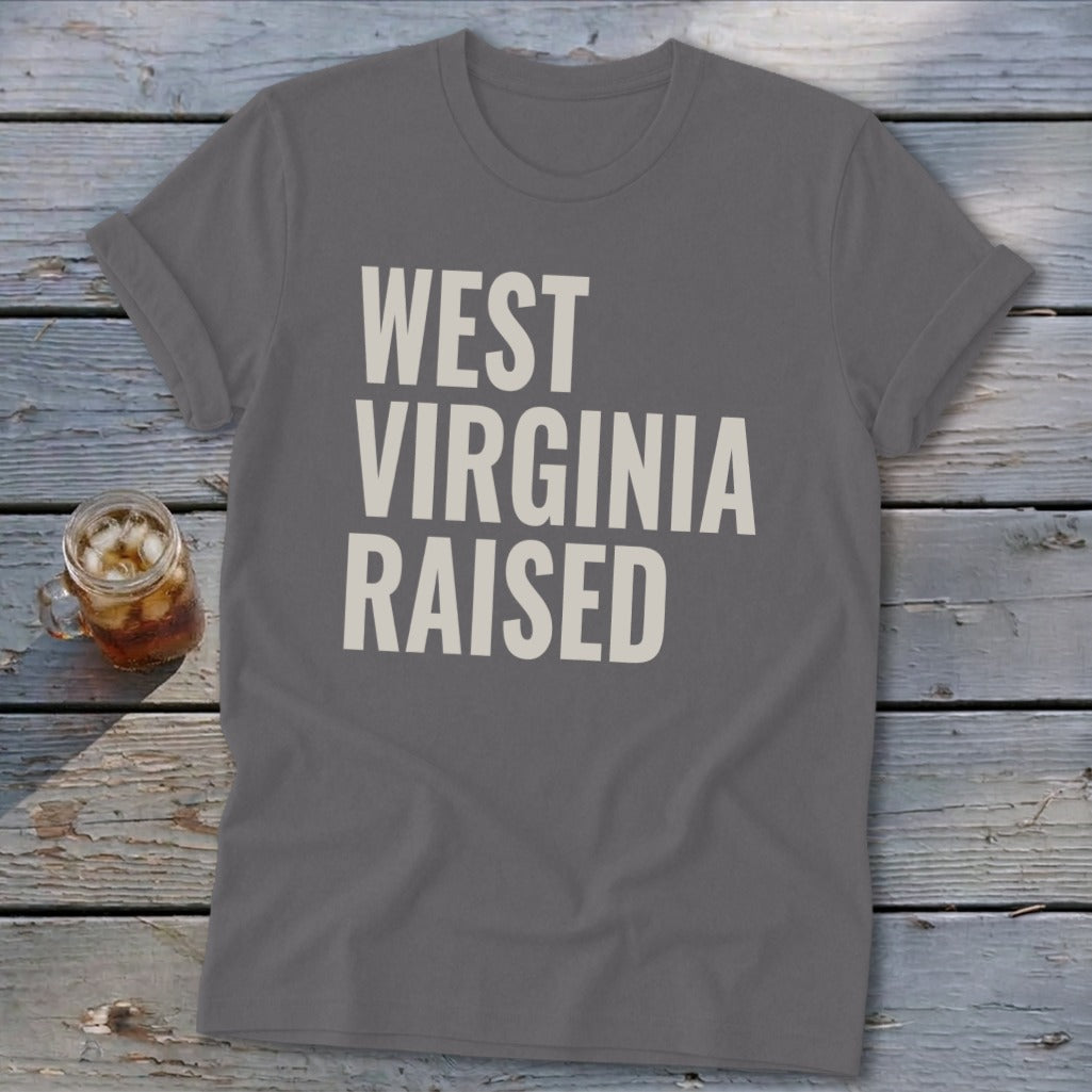 Grey t-shirt with "West Virginia Raised" text in cream.