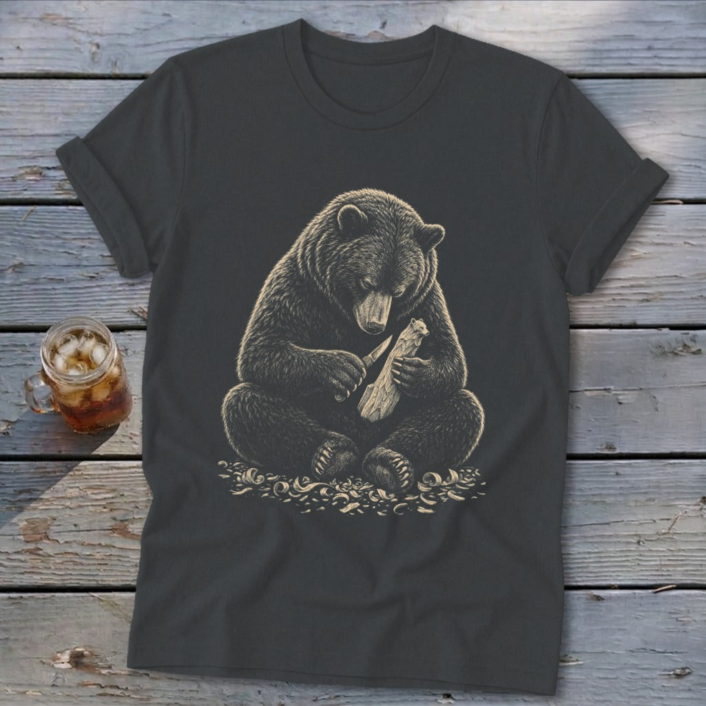 Black t-shirt with bear carving wood with a knife illustration.
