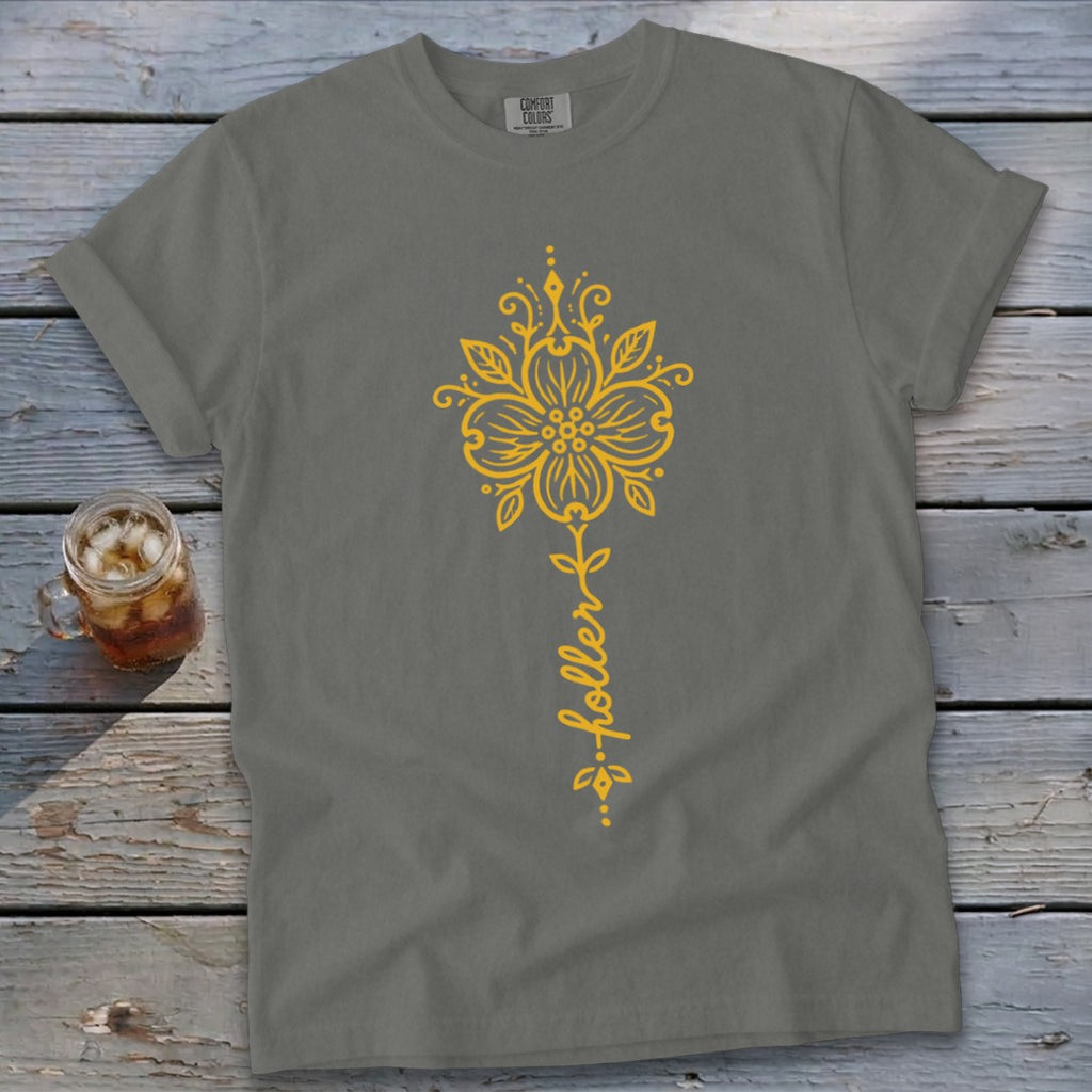 Grey t-shirt with yellow floral design and "holler" text.
