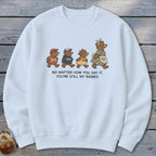 Light blue sweatshirt with graphic of four bears and text "No Matter How You Say It, You're Still My Babies".