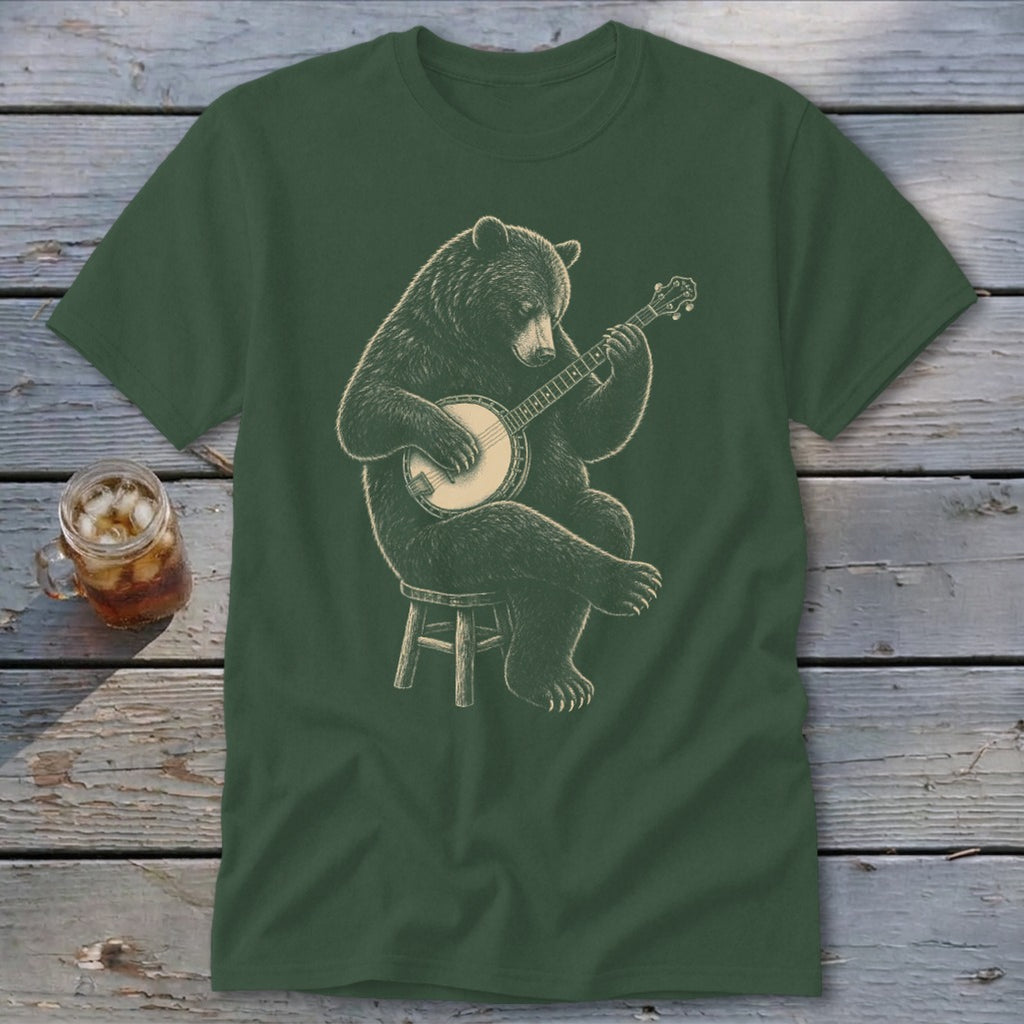 Green t-shirt with a drawing of a bear sitting on a stool playing a banjo.