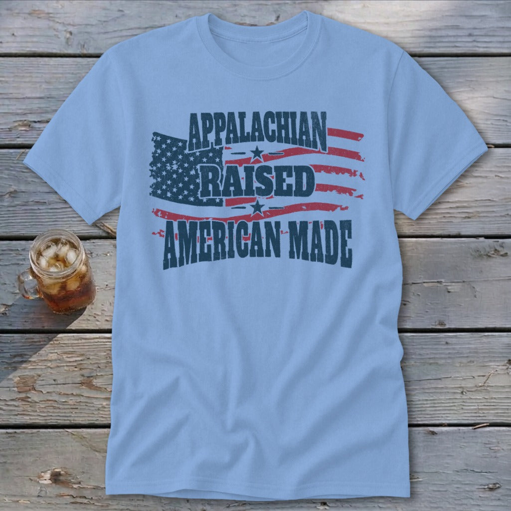 Light blue t-shirt with "Appalachian Raised American Made" in distressed navy print over an American flag.