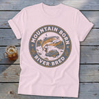 T-shirt with circular graphic featuring a leaping fish, rocks, and text "MOUNTAIN BORN RIVER BRED".