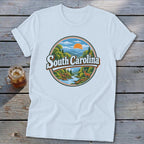 White t-shirt with circular South Carolina mountain scene and deer graphic.