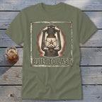 Olive green t-shirt with a vintage lantern graphic and the text "BUILT TO LAST".