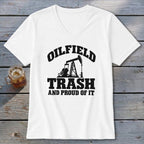 White v-neck t-shirt with "OILFIELD TRASH AND PROUD OF IT" and oil derrick graphic.