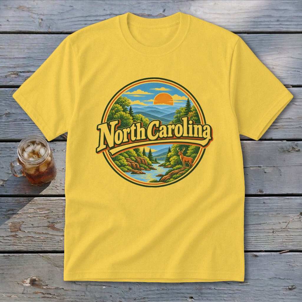 Yellow t-shirt with "North Carolina" text over a circular mountain and river landscape.