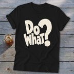 A black t-shirt with rolled-up sleeves features the text "Do what?" printed in cream-colored capital letters.