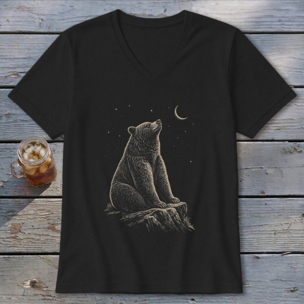 Black t-shirt with a bear sitting on a rock, looking at the moon and stars.