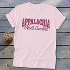 Pink t-shirt with "APPALACHIA #North Carolina" text in maroon.
