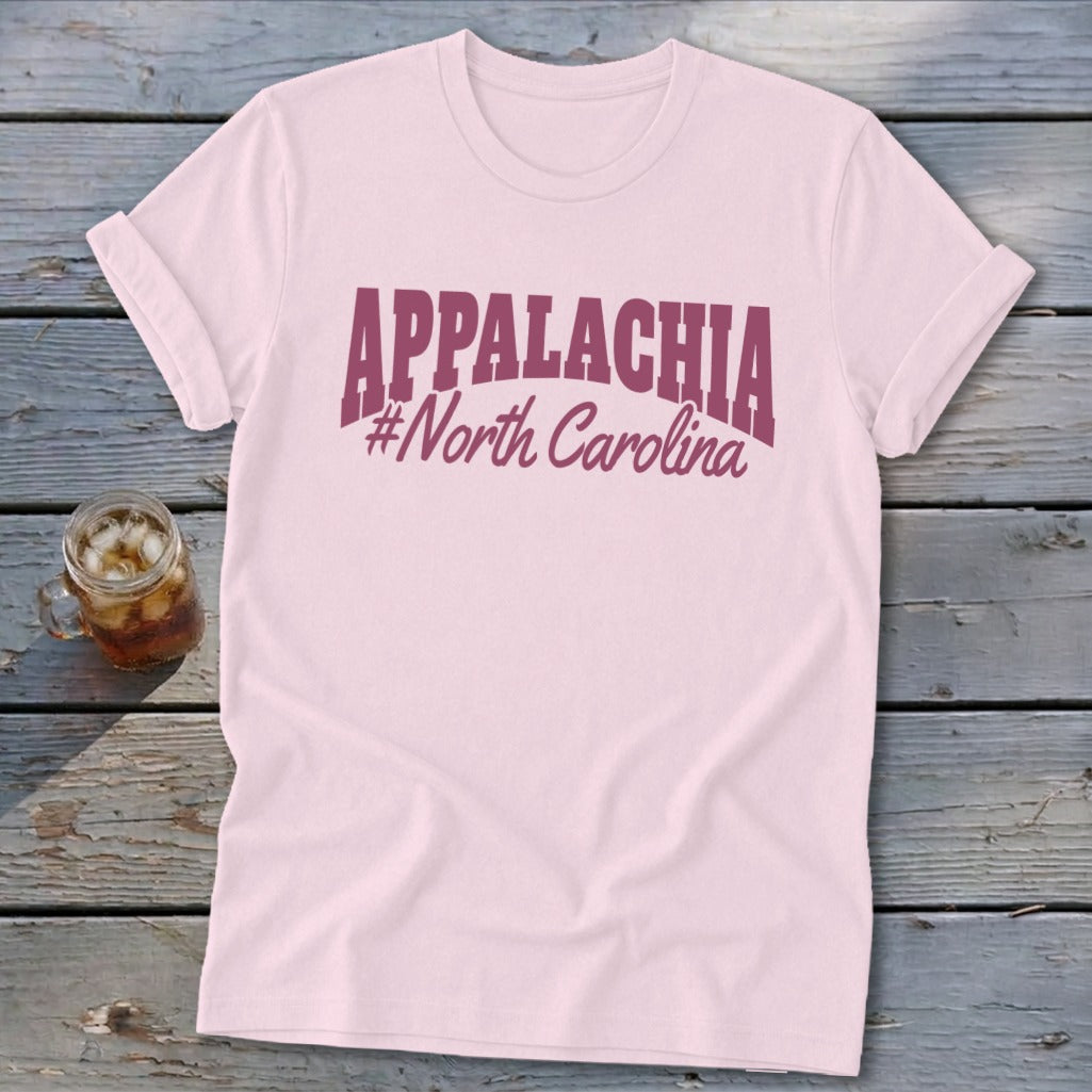 Pink t-shirt with "APPALACHIA #North Carolina" text in maroon.
