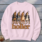 Pink sweatshirt with four howling hound dogs and the text "holler".