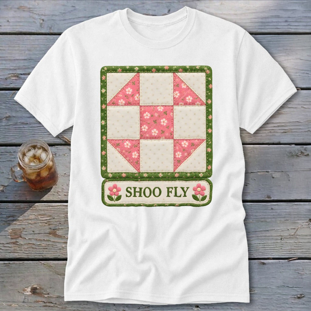 White t-shirt with a square quilt block design and "SHOO FLY" text.