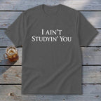 Gray t-shirt with white text "I AIN'T STUDYIN' YOU" and a glass of iced tea.