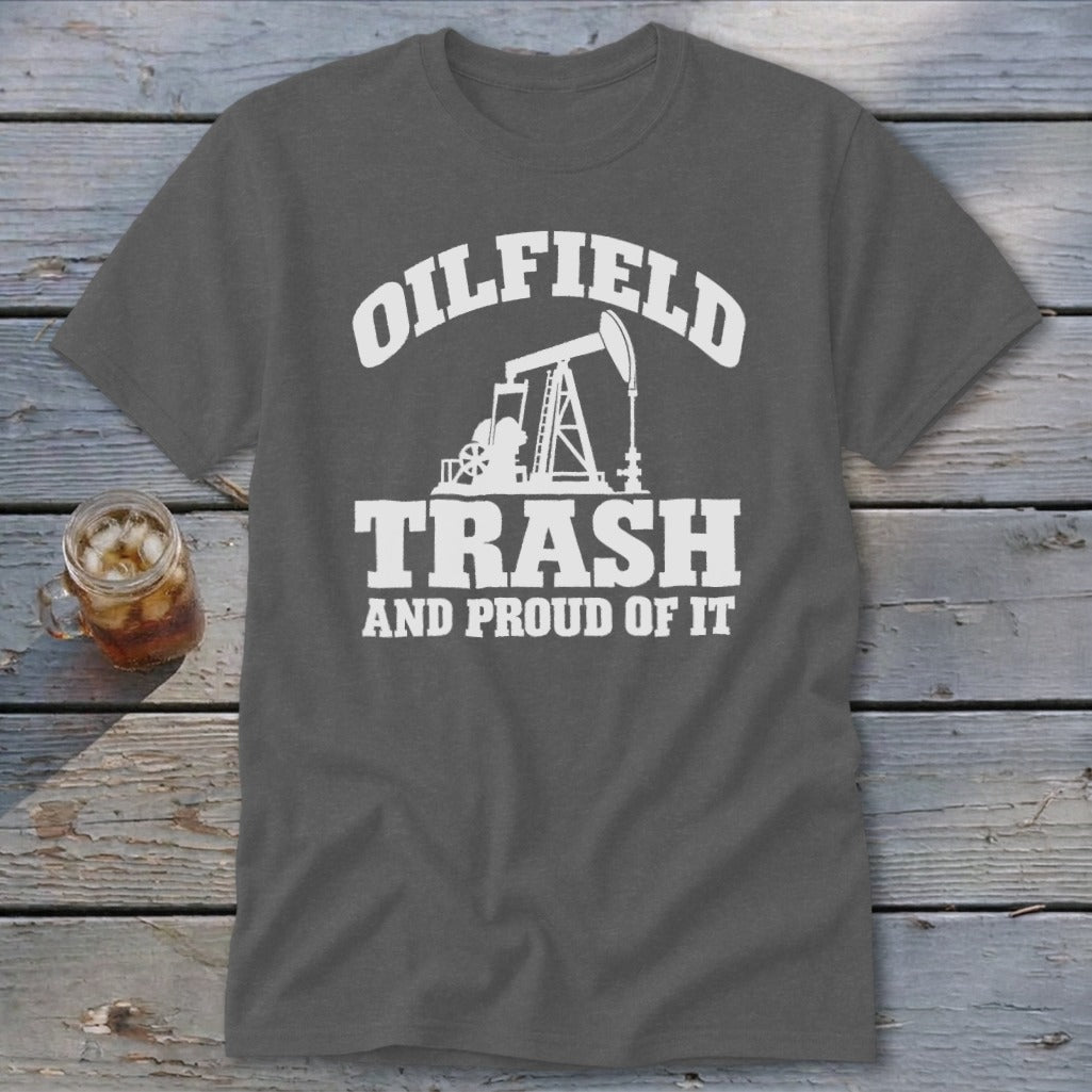 Dark gray t-shirt with white graphic of oil pump jack and text "OILFIELD TRASH AND PROUD OF IT".