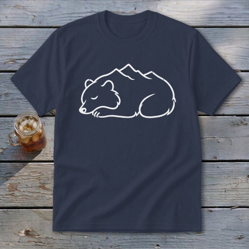 Dark blue t-shirt with white outline graphic of a sleeping bear integrated with mountains.