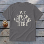 Gray t-shirt with "WE SPEAK MOUNTAIN HERE" text in cream color.