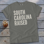 Gray t-shirt with "SOUTH CAROLINA RAISED" in cream text.