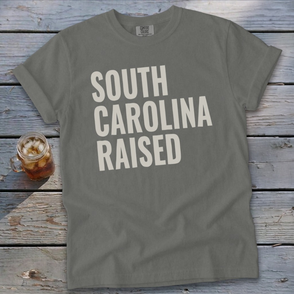 Gray t-shirt with "SOUTH CAROLINA RAISED" in cream text.