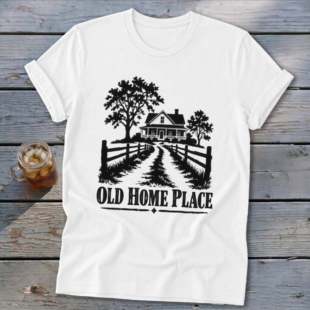 White t-shirt with graphic of a farmhouse, trees, and fence, text Old Home Place.