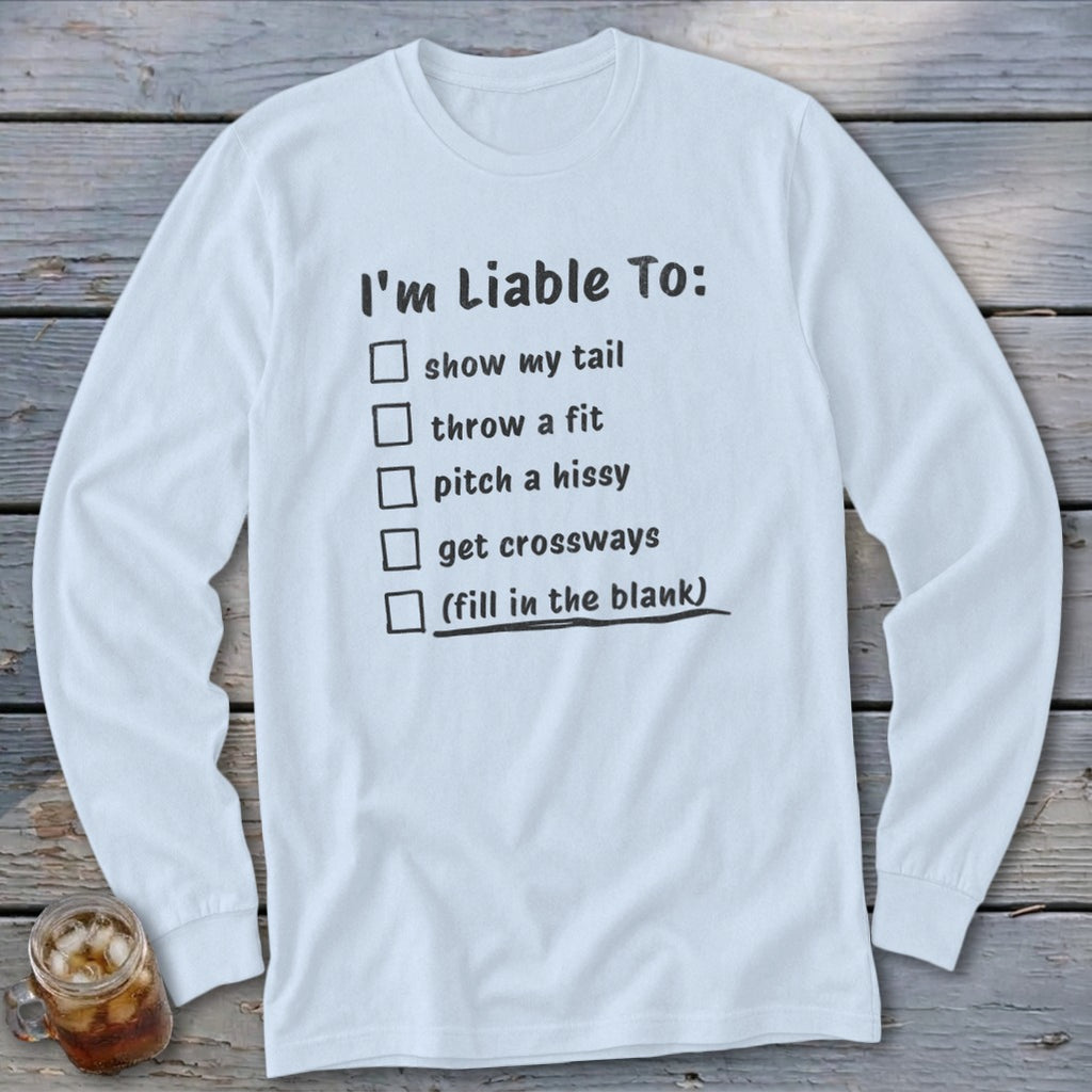 White long-sleeve shirt with "I'm Liable To:" and a checklist of phrases.