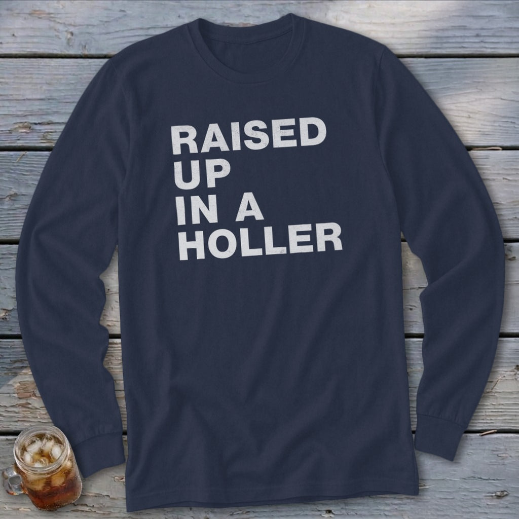 Navy long-sleeve shirt with white text: "RAISED UP IN A HOLLER."