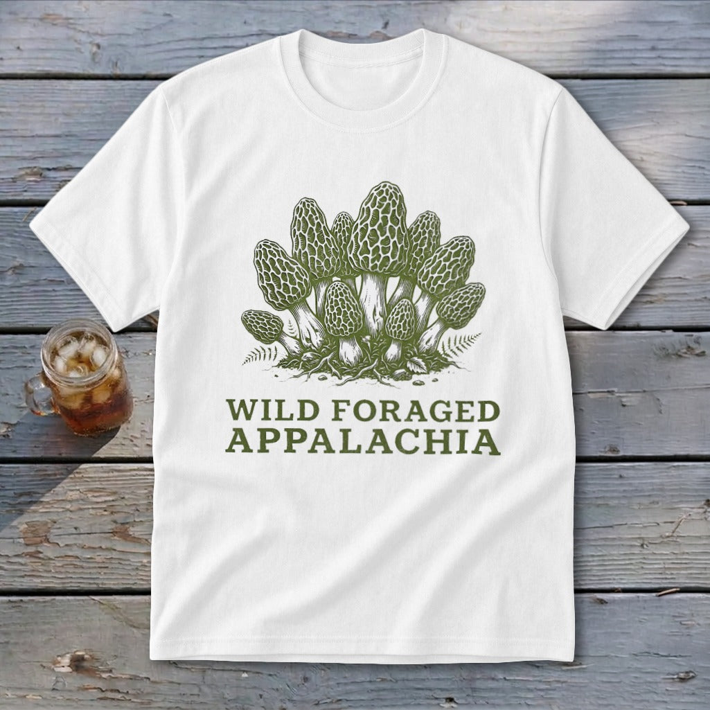 White t-shirt with green illustration of morel mushrooms and text "Wild Foraged Appalachia".