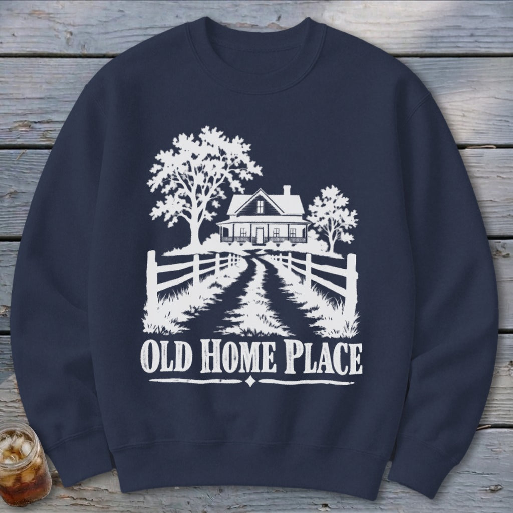 Navy sweatshirt with white graphic of a farmhouse, trees, fence, and text "OLD HOME PLACE".