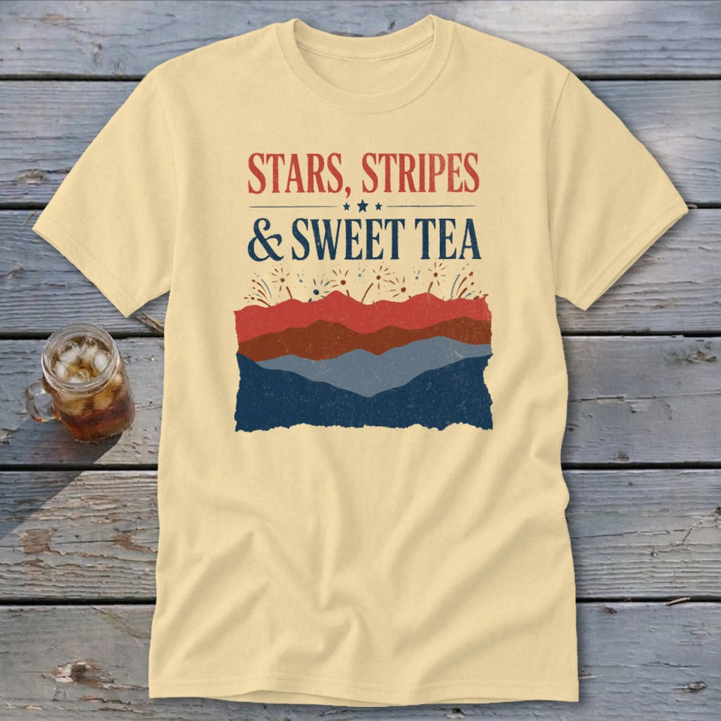 A light yellow short-sleeve t-shirt with red, white, and blue text reading STARS, STRIPES & SWEET TEA.
