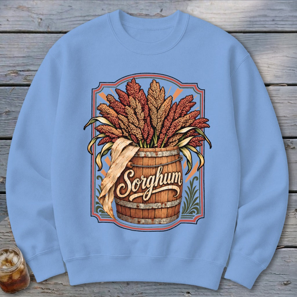 Sorghum grain stalks in a wooden barrel with decorative border and text.