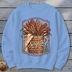 Sorghum grain stalks in a wooden barrel with decorative border and text.