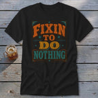 Black t-shirt with "Fixin To Do Nothing" text in a vintage style.