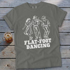 Gray t-shirt with white graphic of three people dancing and "FLAT-FOOT DANCING" text.