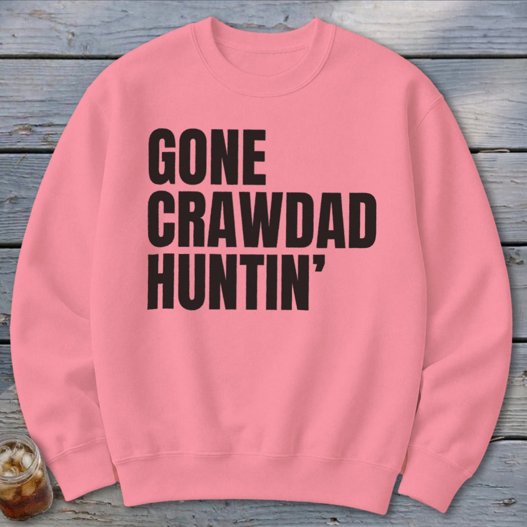 Pink sweatshirt with "GONE CRAWDAD HUNTIN'" text in black.