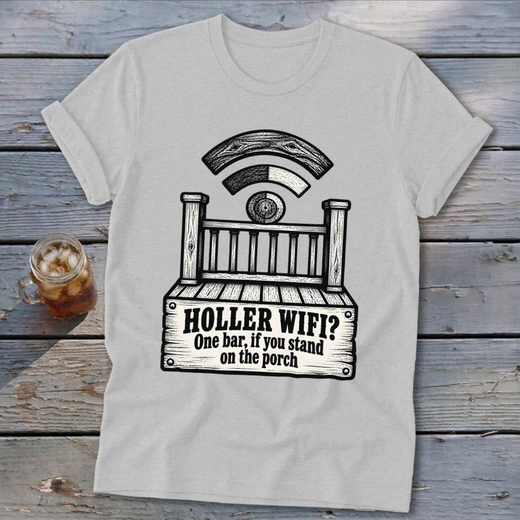 A light gray t-shirt featuring a black graphic of a wooden porch with Wi-Fi signals and text reading HOLLER WIFI? One bar, if you stand on the porch.
