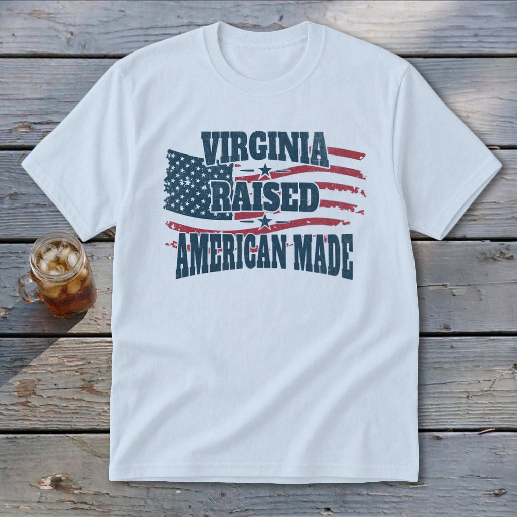 White t-shirt with "Virginia Raised American Made" text and distressed US flag graphic.