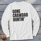 White long-sleeve shirt with black text that reads "GONE CRAWDAD HUNTIN'".