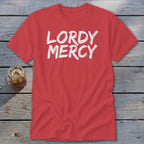 Red t-shirt with white "LORDY MERCY" text and a glass of iced beverage.