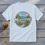 White t-shirt with circular Mississippi nature graphic featuring river and deer.