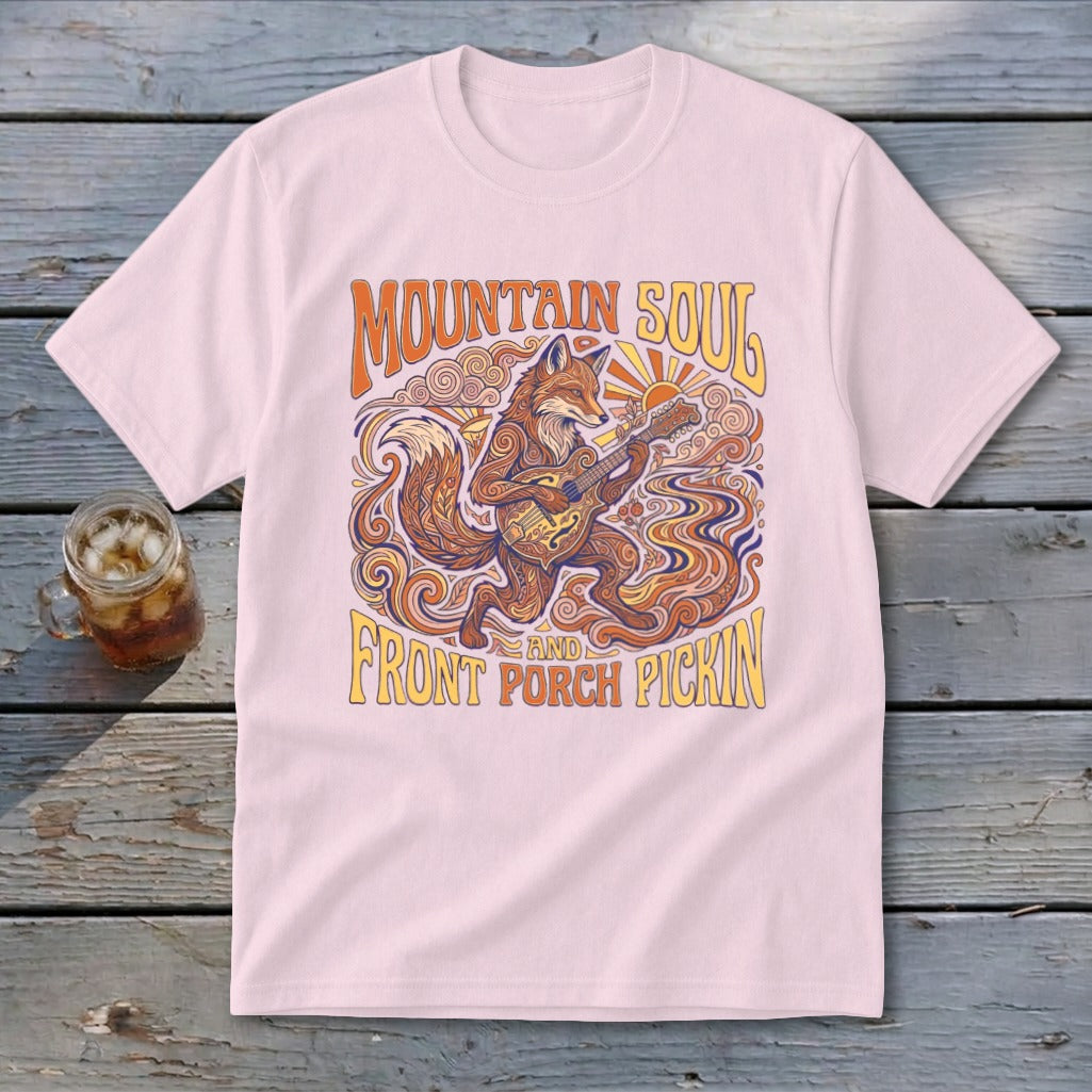 Pink t-shirt with a fox playing guitar and text "Mountain Soul and Front Porch Pickin".