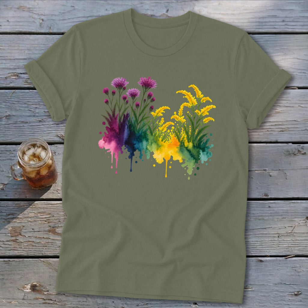 Olive green t-shirt with watercolor floral print of purple and yellow flowers.
