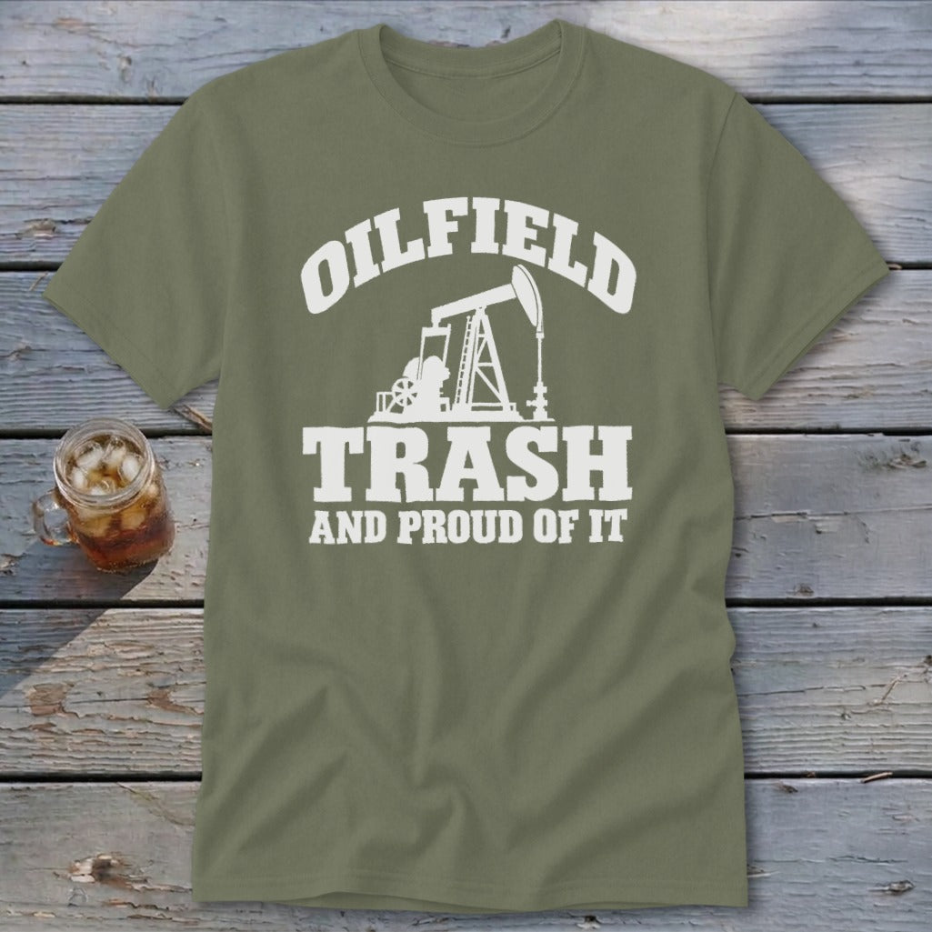 Green t-shirt with white text and oil pump graphic: "OILFIELD TRASH AND PROUD OF IT"