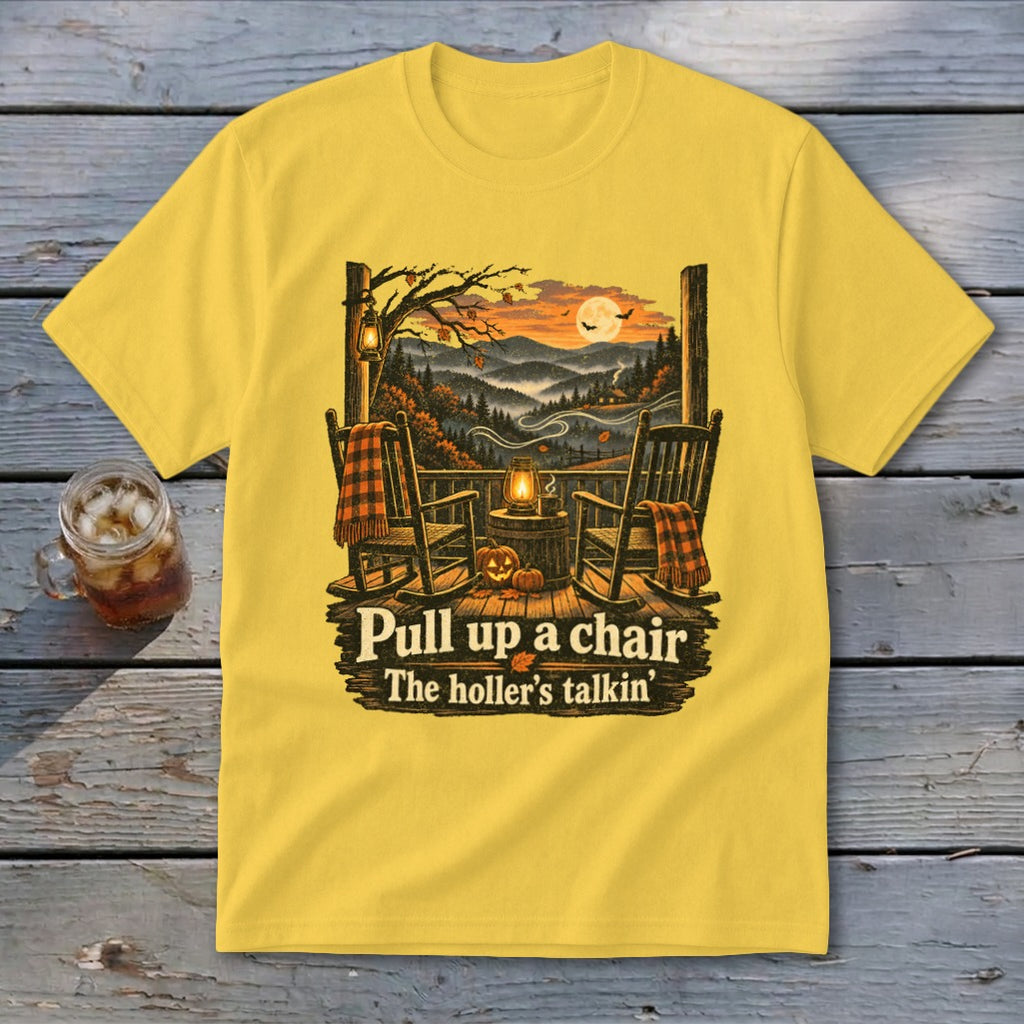Yellow t-shirt with autumn porch scene and "Pull up a chair" text.